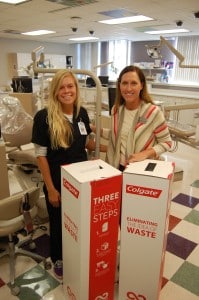 Heather Adkins (left) and Rebecca Caceres with recycling box.