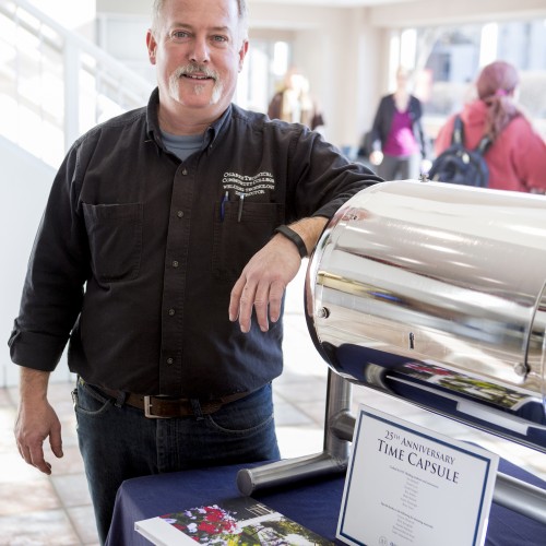 Jim Bridwell, Welding Instructor, Poses With The Capsule